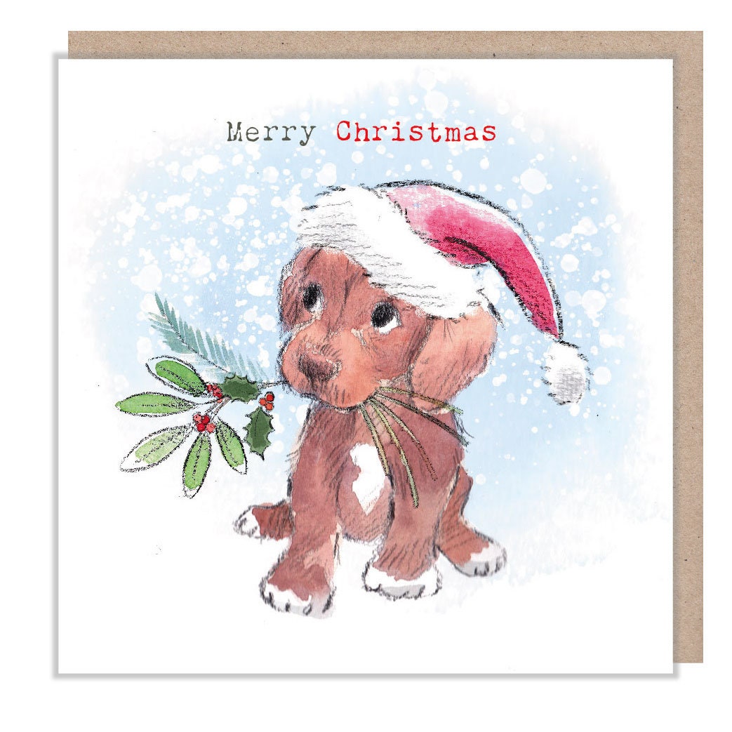 Christmas Card - Brown Puppy Wearing Hat - Holding Foliage in It's Mouth. Merry Christmas