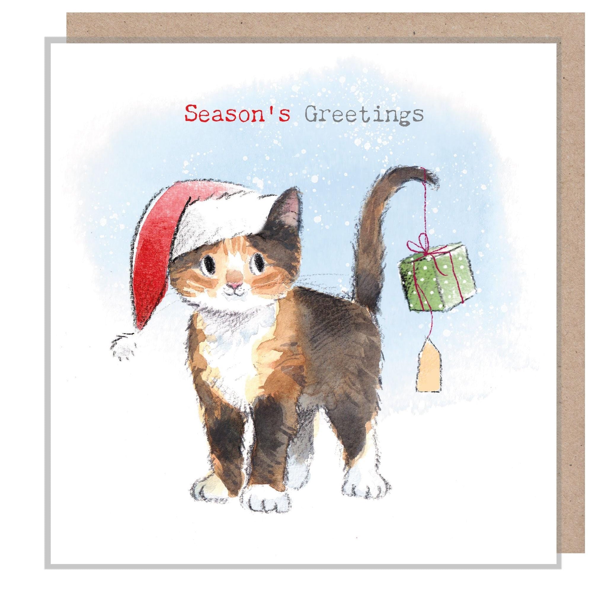 Christmas Card - Kitten with Present Hanging From Tail - Season's Greetings
